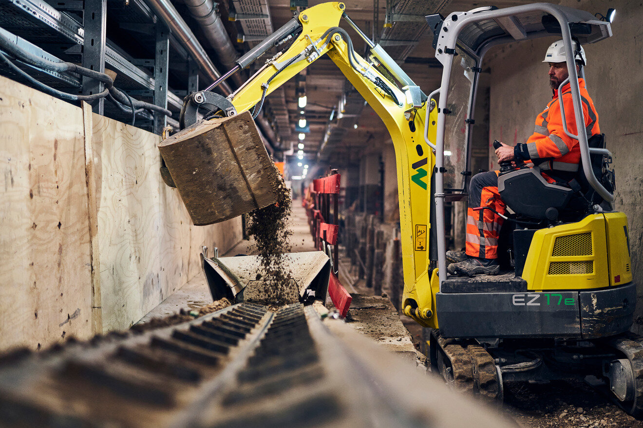 battery-powered electric excavator at work